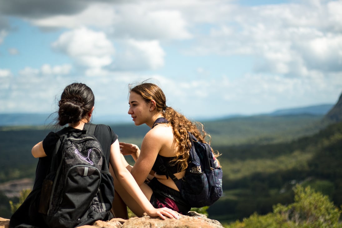 Two Woman Sitting 